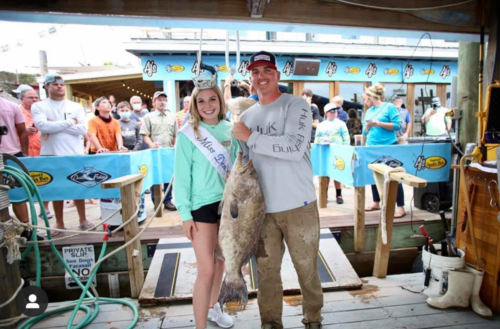 Weighing in with Miss Destin at the Fishing Rodeo