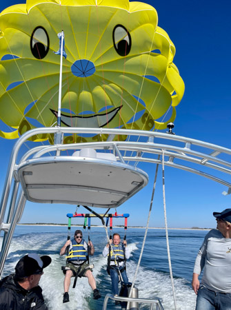 Taking off from the parasailing boat in Destin Florida