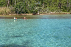 People snorkeling in Destin Florida on the shores near Crab ISland